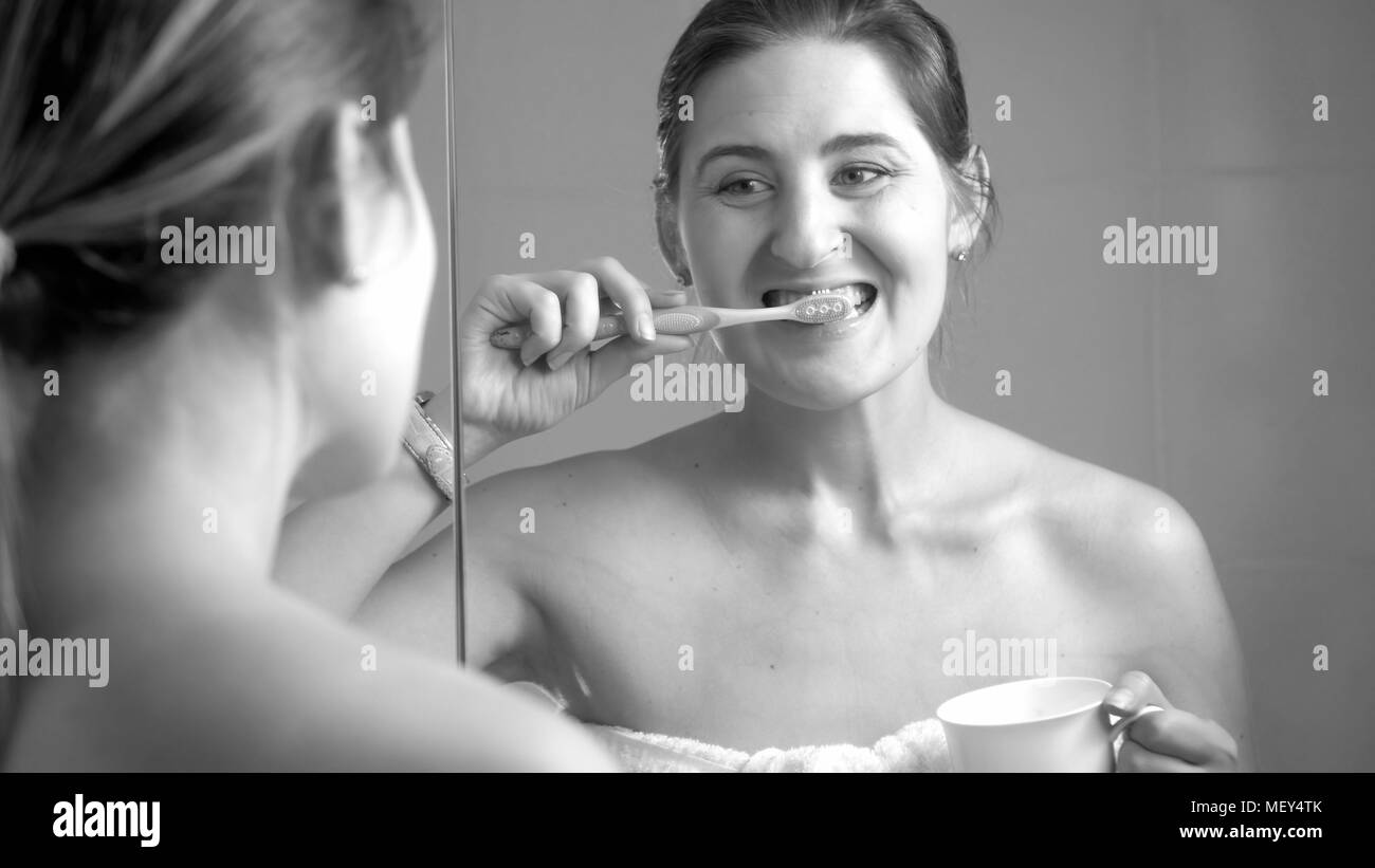 Girl brushing teeth Black and White Stock Photos & Images - Alamy