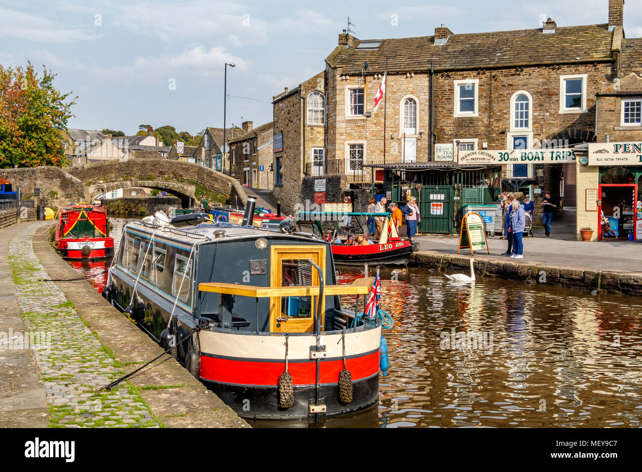 Narrow boats moored on the Leeds and Liverpool Canal at Skipton in North Yorkshire, UK. Stock Photo