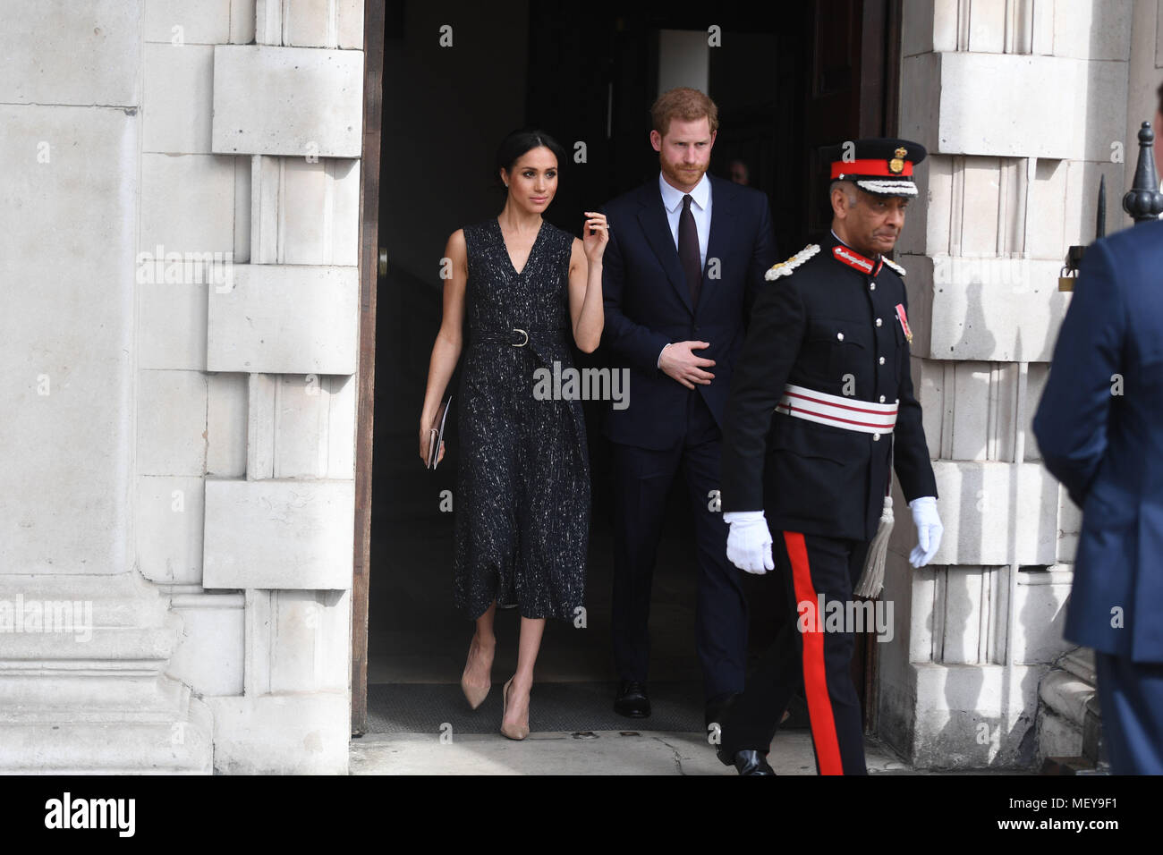 Prince Harry and Meghan Markle leaving after attending a memorial service at St Martin-in-the-Fields in Trafalgar Square, London to commemorate the 25th anniversary of the murder of Stephen Lawrence. Stock Photo