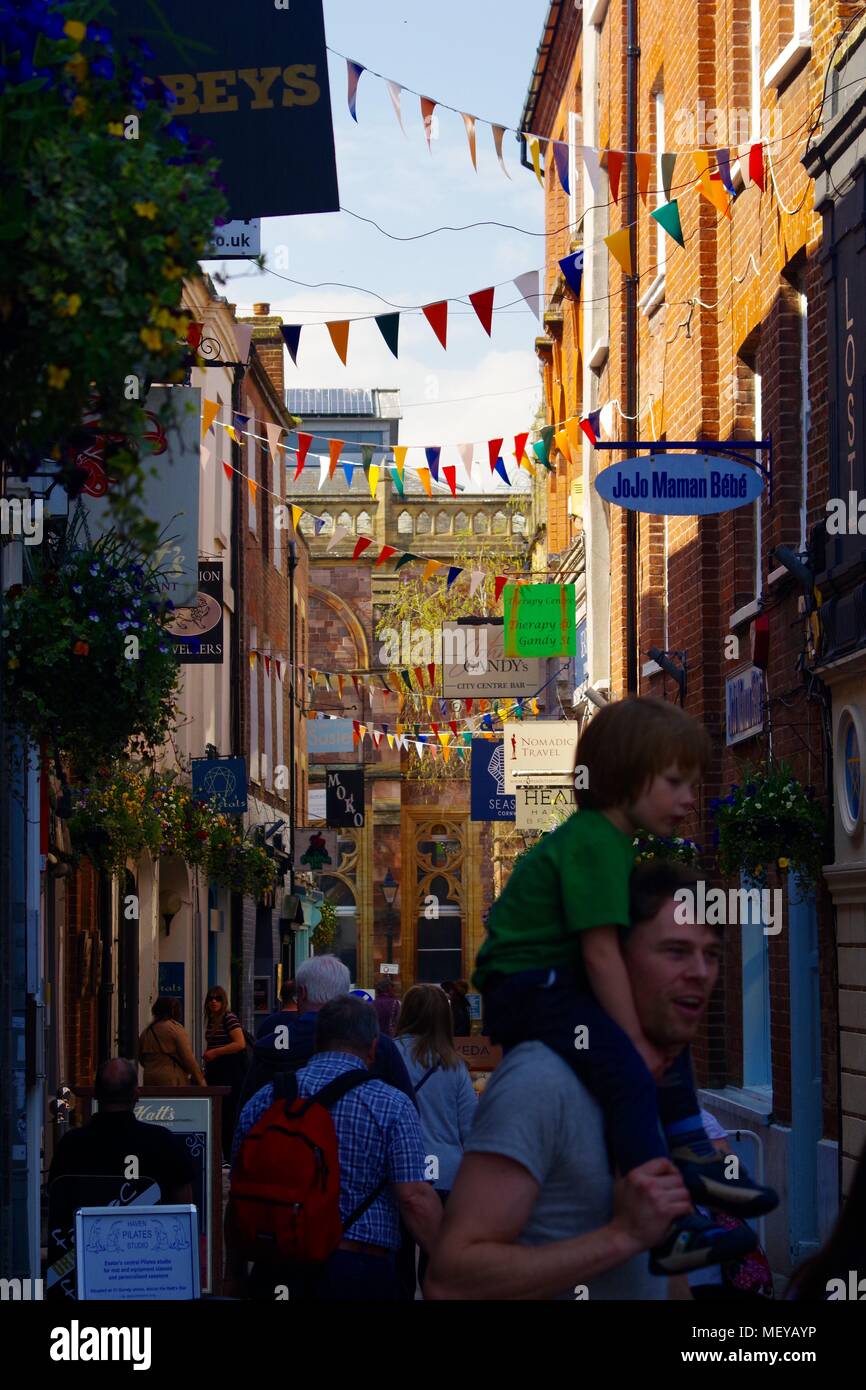 Gandy Street with Bunting in Exeter, Devon, UK. Narrow Cobbled Lane of