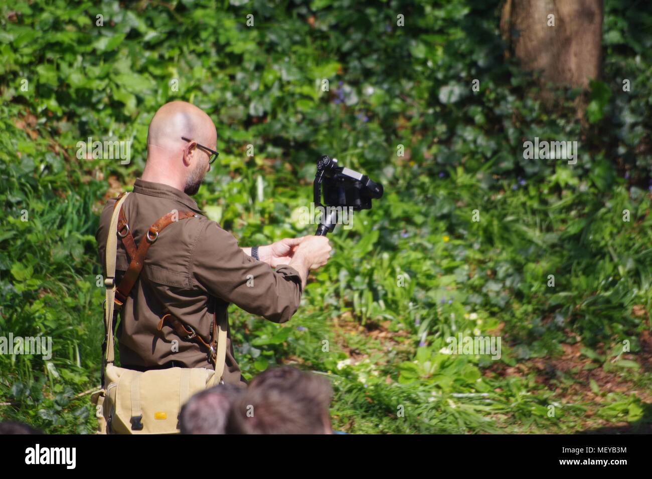 Professional Photographer Recording the Events of RAMM'S Carnival of the Animals in Rougemont Gardens. Exeter, Devon, UK. April, 2018. Stock Photo