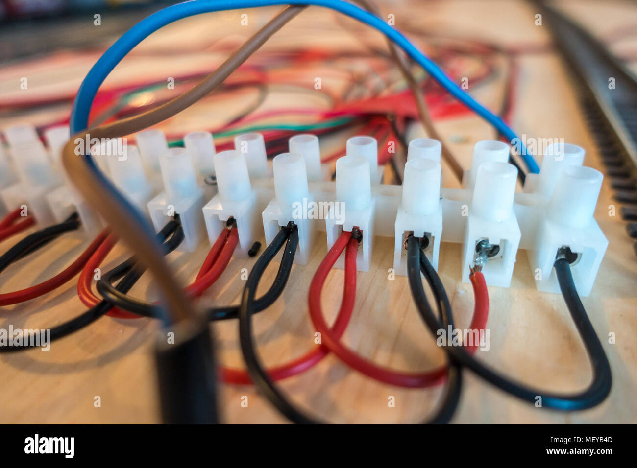 A terminal strip with lots of connected wires Stock Photo Alamy