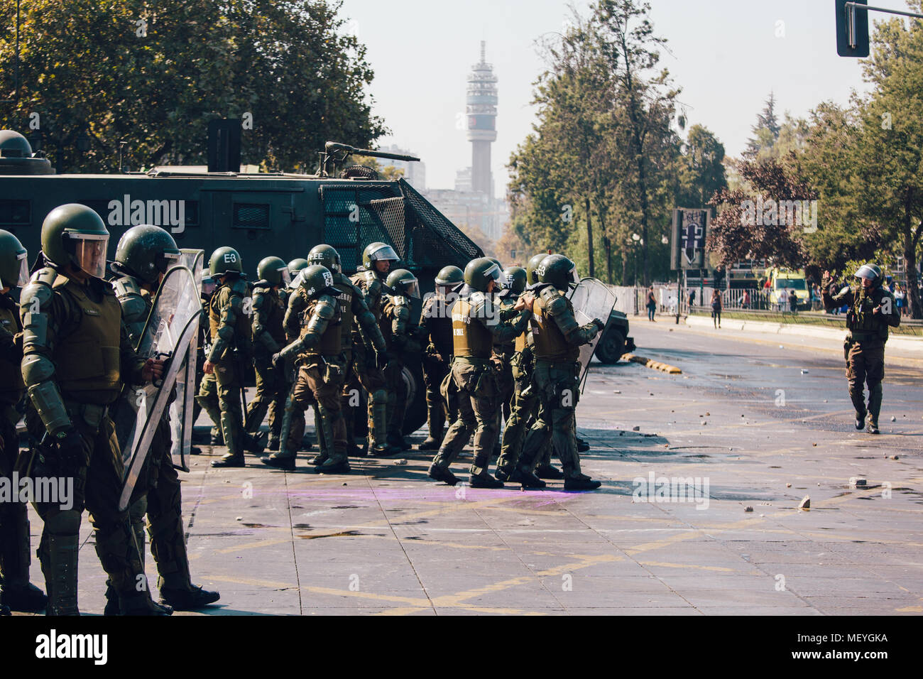 Santiago, Chile - April 19, 2018: Chilean riot Police disperse protesters during a demonstration demanding an end to the Profit in the Education. Stock Photo