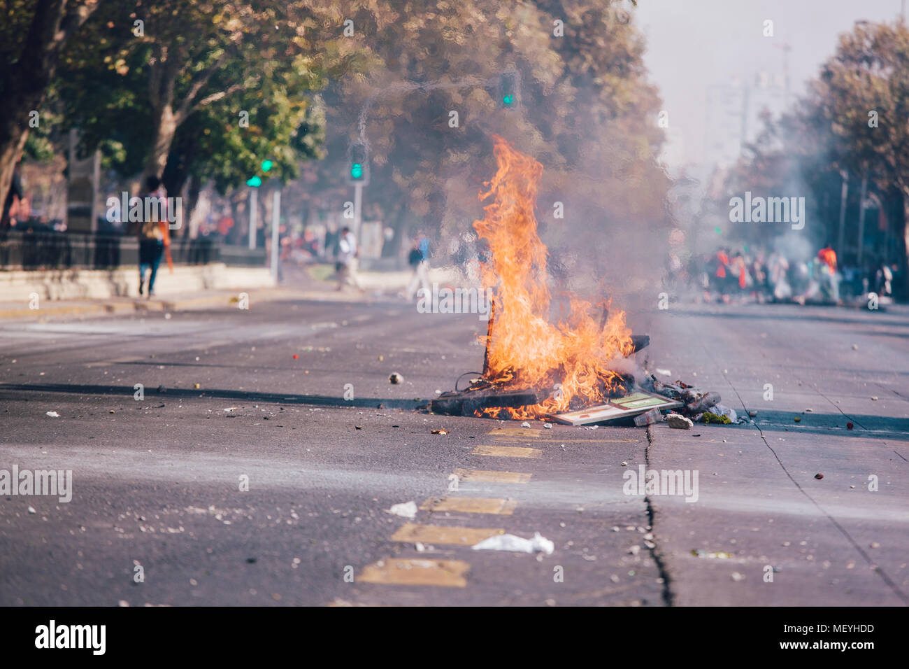 Santiago, Chile - April 19, 2018: Barricades on the street during a demonstration demanding an end to the Profit in the Education. Stock Photo