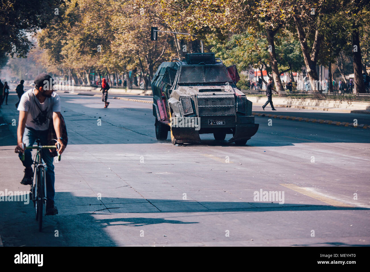 Santiago, Chile - April 19, 2018:  Riot police vehicle patrol the streets during a demonstration demanding an end to the Profit in the Education. Stock Photo