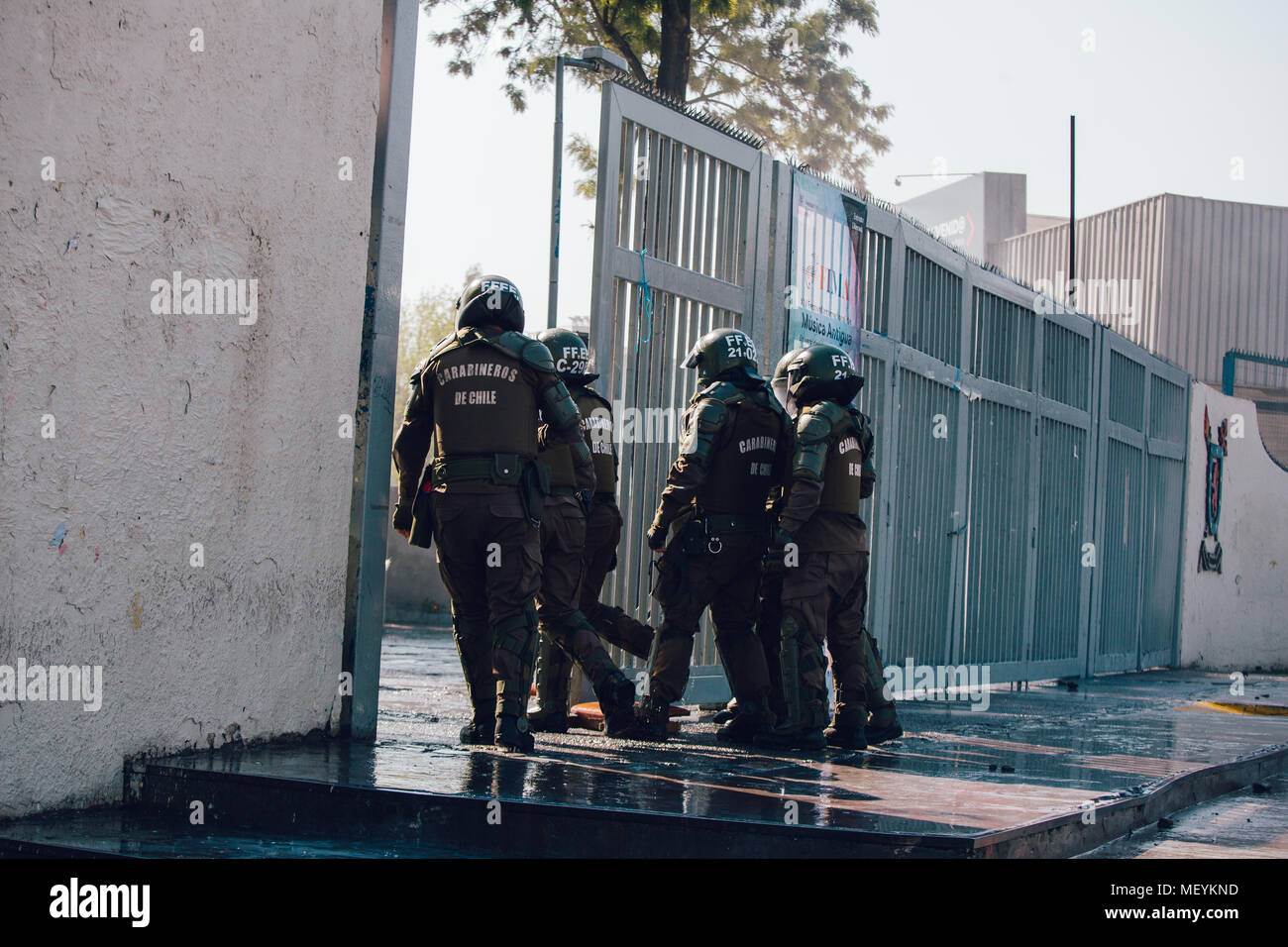 Santiago, Chile - April 19, 2018: Riot police enter the University of Santiago looking for protesters during a demonstration demanding an end to the P Stock Photo