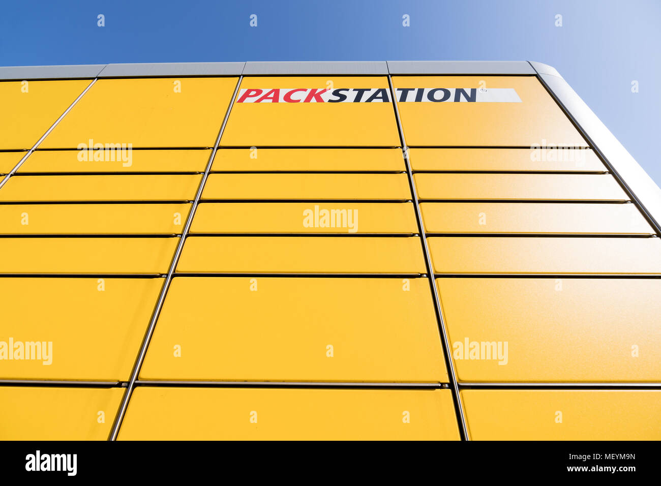 DHL Packstation (Parcelstation), providing automated booths for self-service collection as well as self-service dispatch of parcels 24 hours a day. Stock Photo