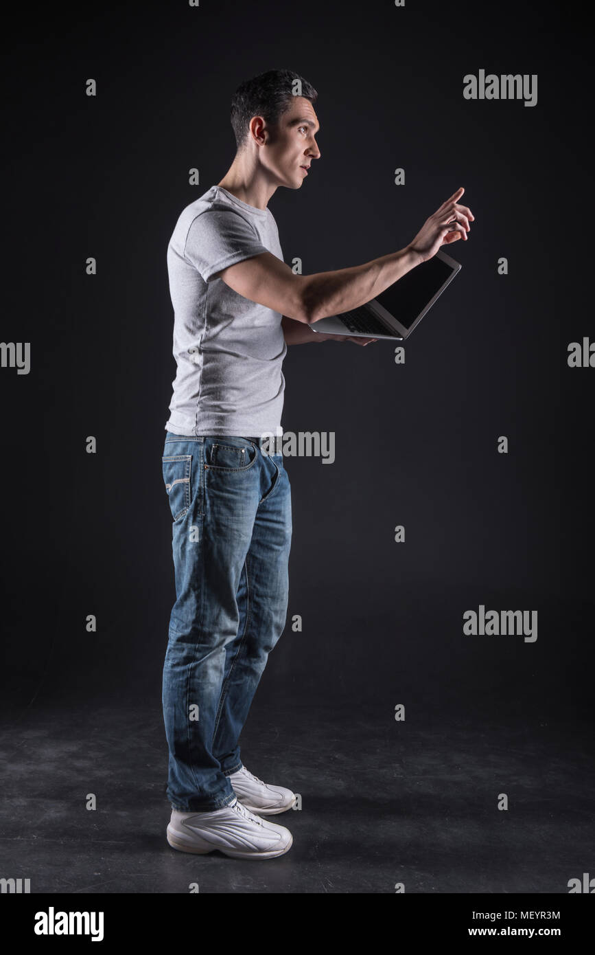 Serious professional programmer working with computer devices Stock ...