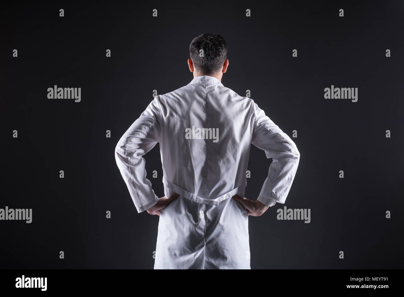 Smart handsome man wearing a labcoat Stock Photo