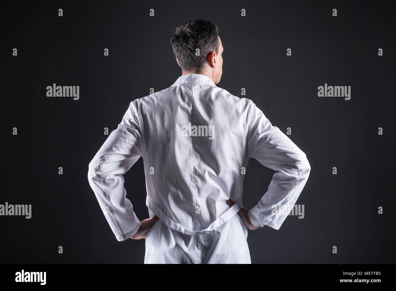 Nice smart scientist wearing a labcoat Stock Photo