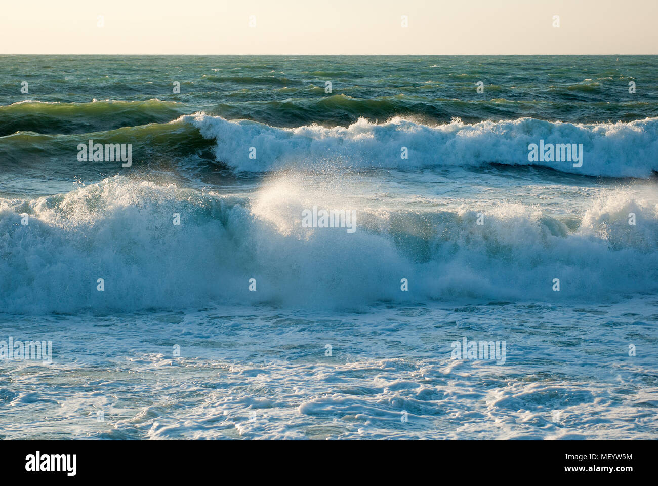 beautiful California ocean storm with huge waves at sunset Stock Photo