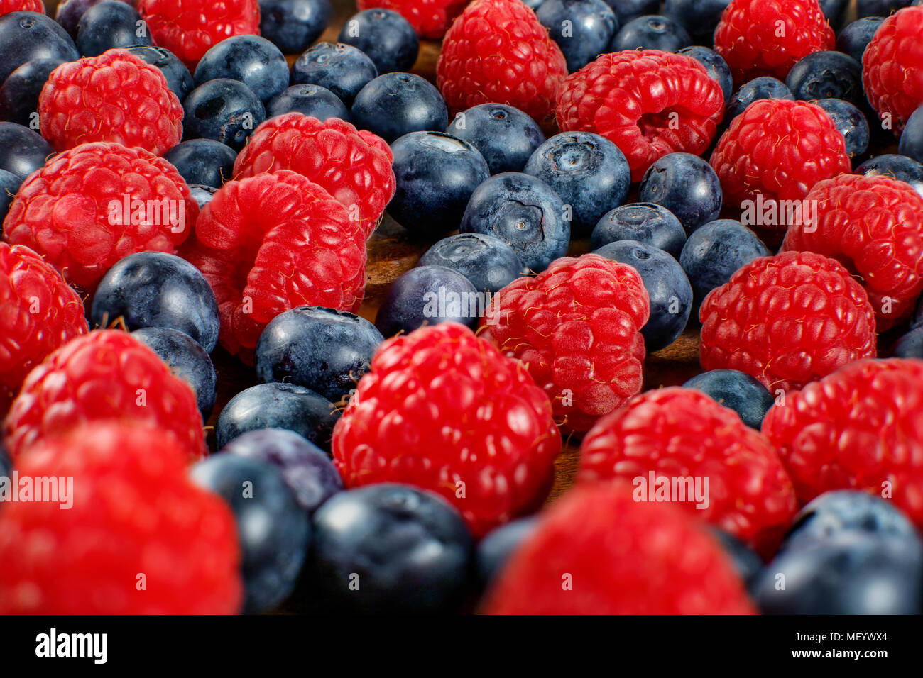 Closeup shot of mixed blueberries and raspberries Stock Photo Alamy