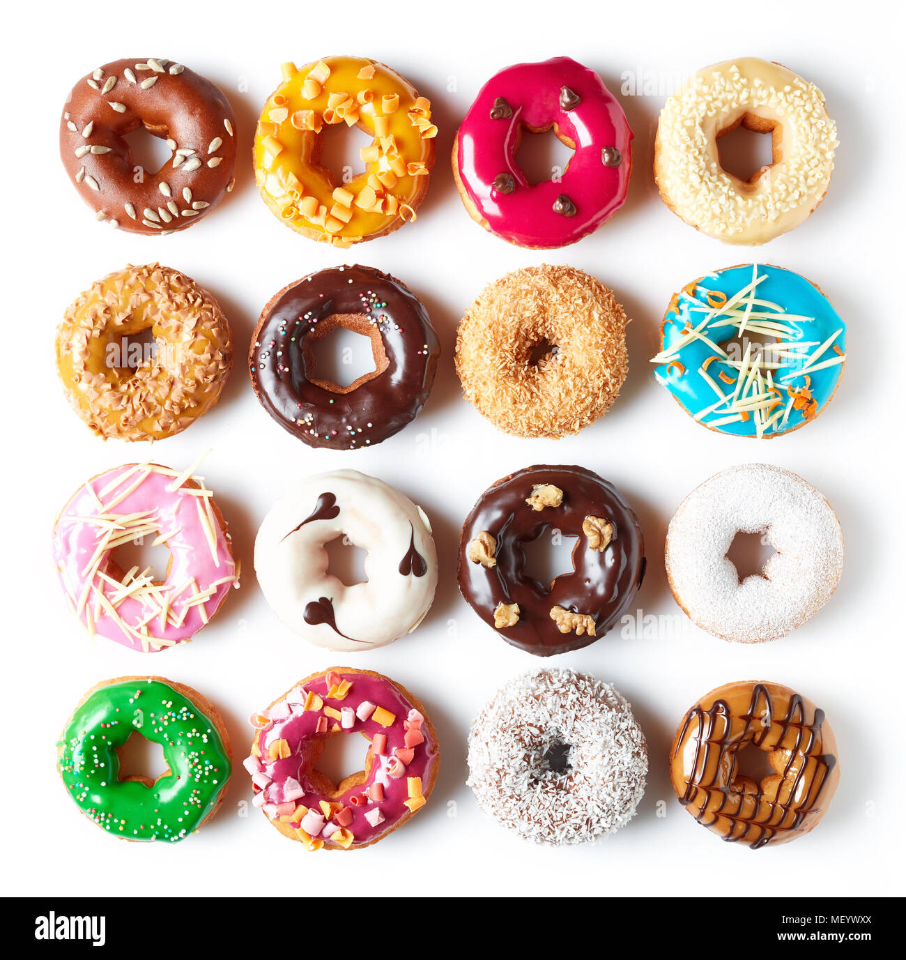 Various colorful donuts isolated on white background, top view Stock ...