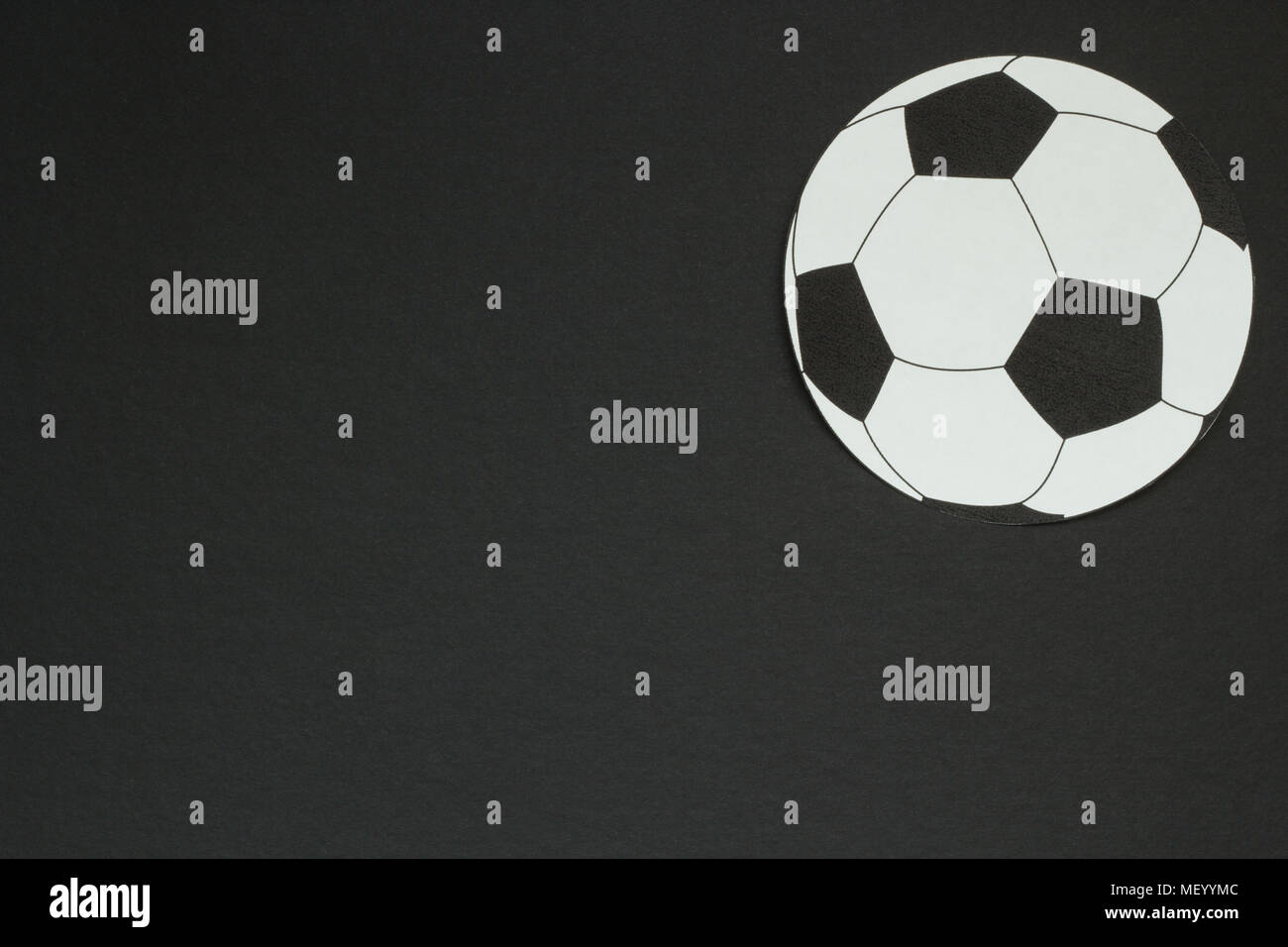 old soccer ball isolated on black background Stock Photo - Alamy