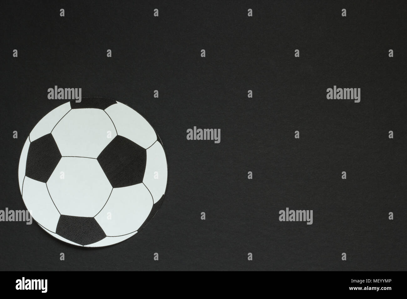 old soccer ball isolated on black background Stock Photo - Alamy