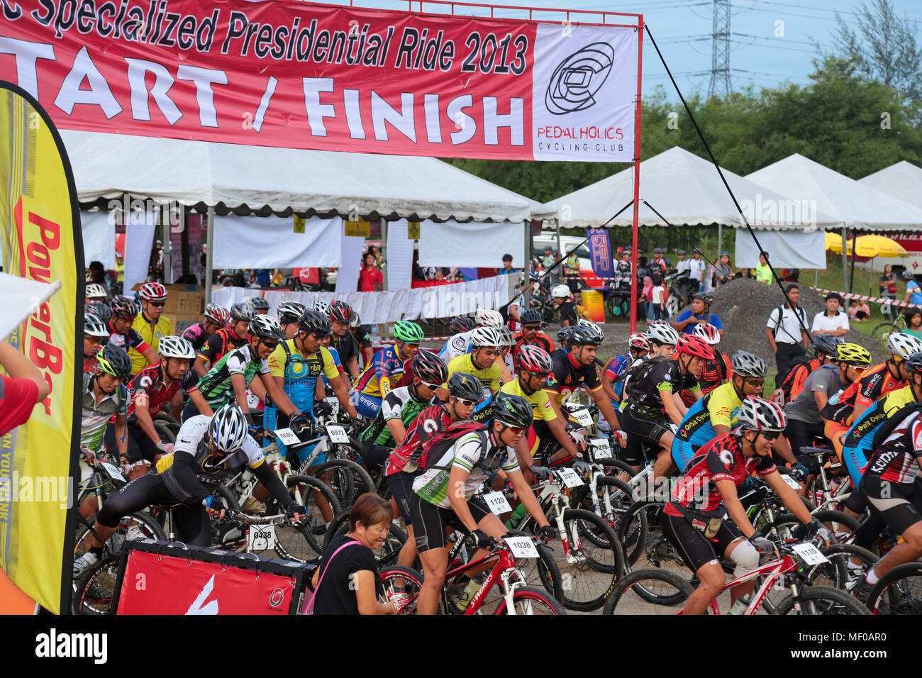 Competitive Bike Riders Participants rush out as the race start for PCC Specialized ...