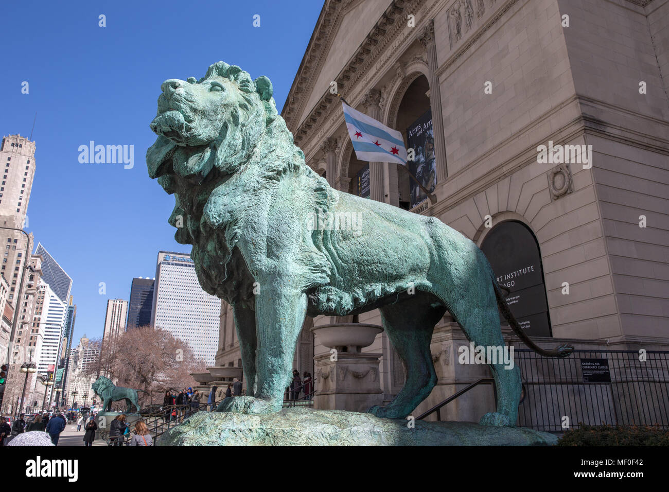 Chicago, USA April 7, 2018 Bronze lion statue standing guard at the