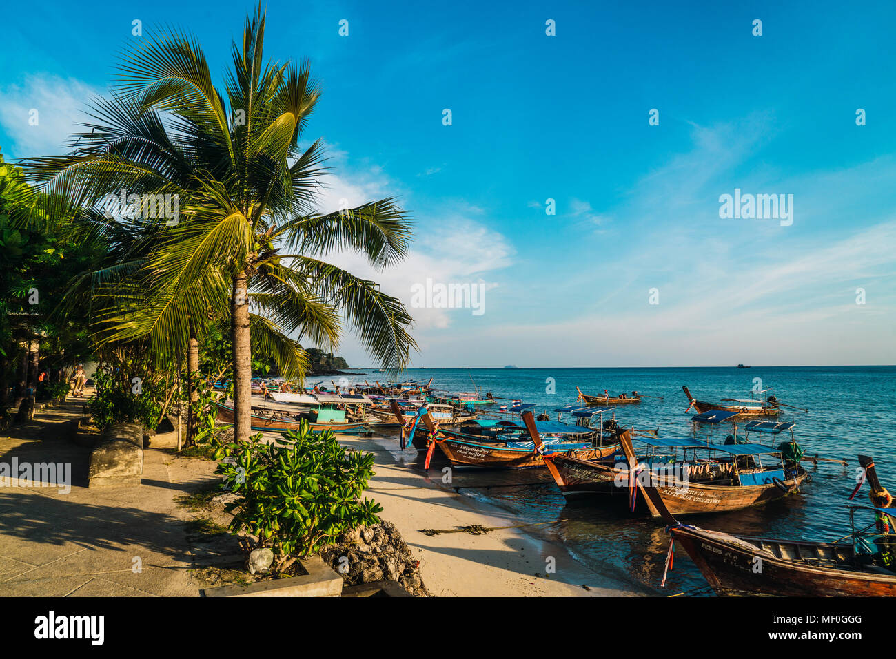 Thailand, Phi Phi Islands, Ko Phi Phi, moored long-tail boats at the beach Stock Photo