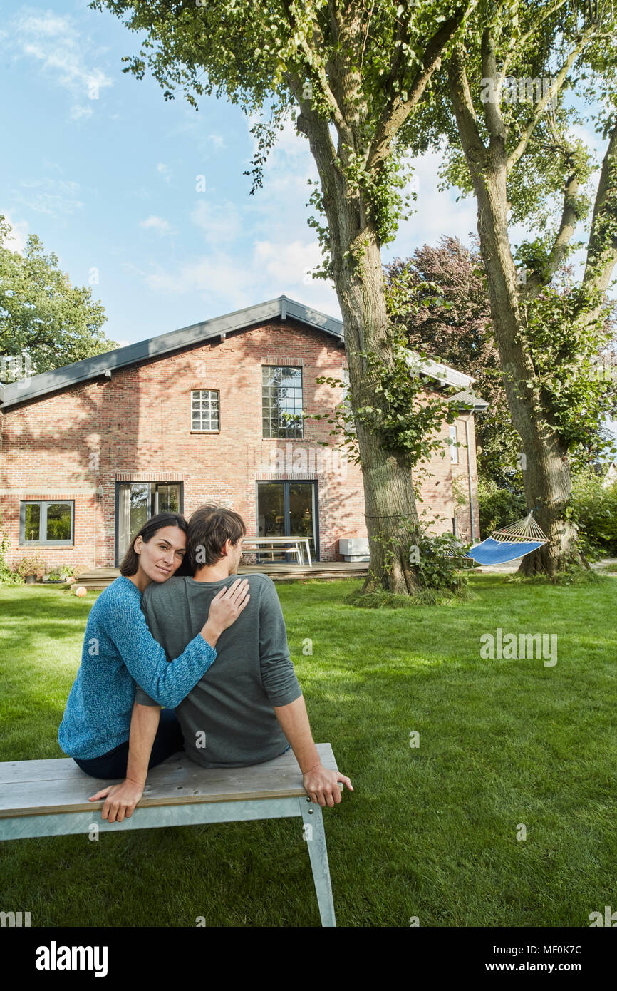 Affectionate couple grass hi-res stock photography and images - Alamy