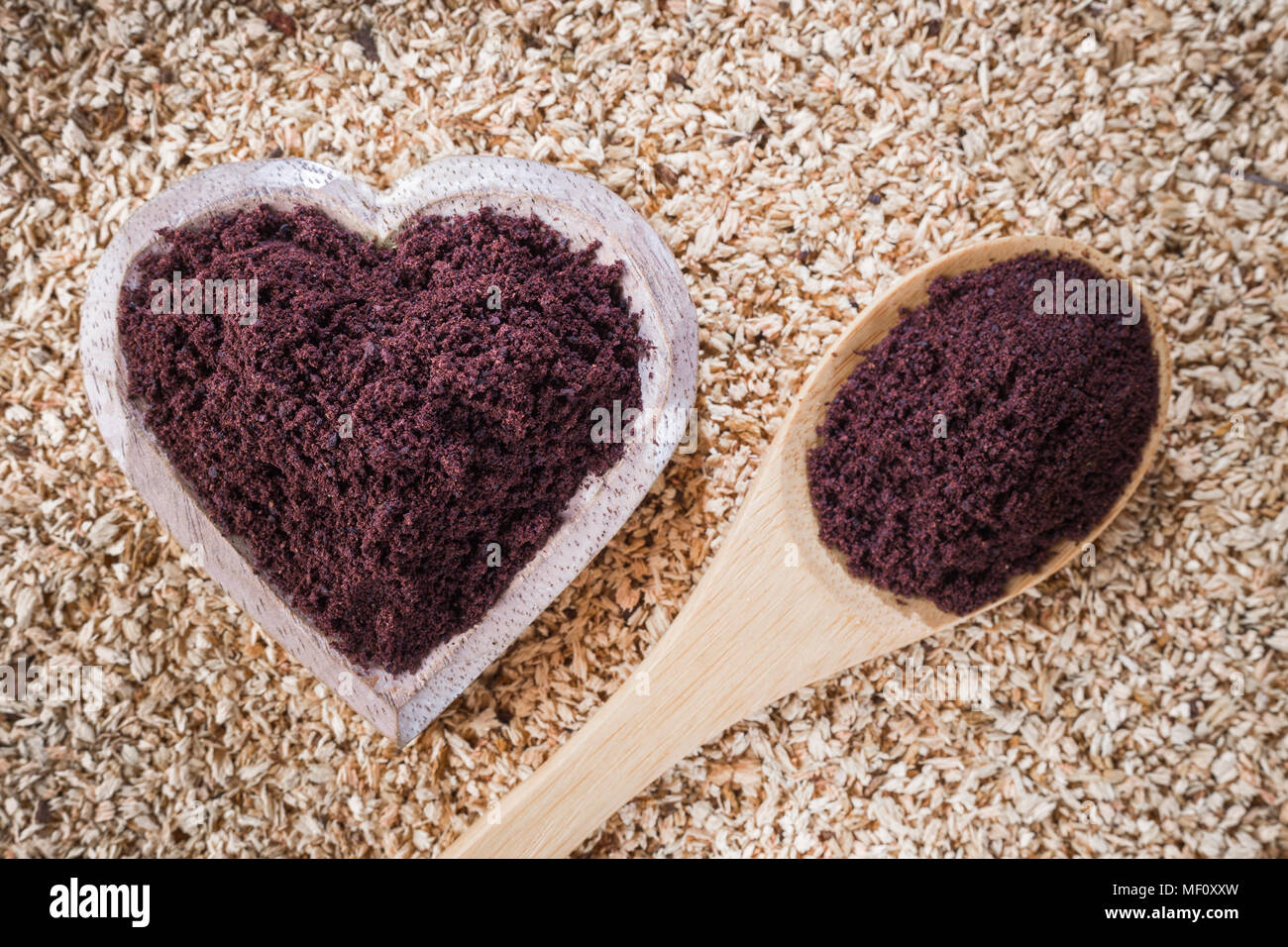 Acai powder in bowl on wooden background Stock Photo Alamy