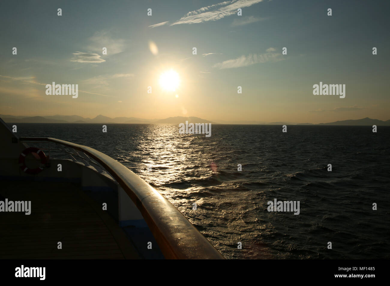 Sunset from the deck of a cruise ship, cruising the Mediterranean Sea. Stock Photo
