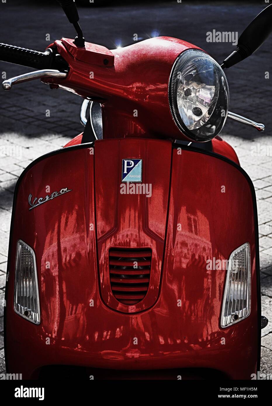 Roaring red Italian Vespa on the streets of South Beach Miami Stock