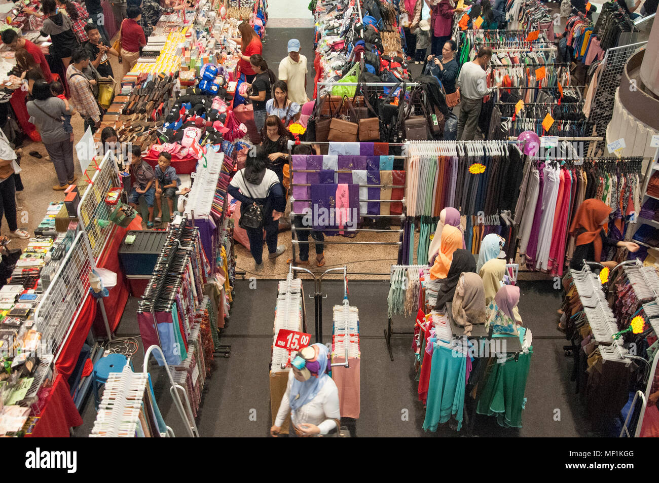 Busy weekend in a city shopping mall, Kota Kinabalu, Malaysian Borneo Stock Photo