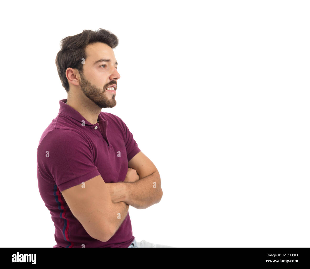 Profile man is with an interested look. Consumer concept concerned, offer.  Beautiful and bearded person. He is wearing a magenta polo shirt. White bac  Stock Photo - Alamy