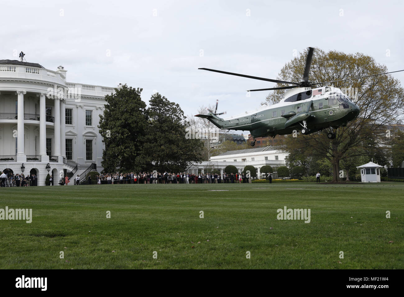 Washington, District of Columbia, USA. 23rd Apr, 2018. Marine One helicopter with U.S. President Donald Trump, France's president Emmanuel Macron and First Ladies Melania Trump and Brigitte Macron on board departs on the South Lawn of the White House in Washington, DC, U.S., on Monday, April 23, 2018. As Macron arrives for the first state visit of Trump's presidency, the U.S. leader is threatening to upend the global trading system with tariffs on China, maybe Europe too. Credit: Yuri Gripas/Pool via CNP Credit: Yuri Gripas/CNP/ZUMA Wire/Alamy Live News Stock Photo