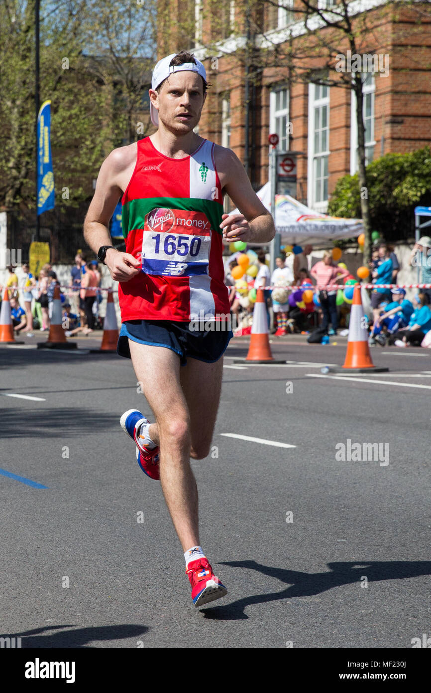 London, UK. 22nd April, 2018. Alistair Smith of Aldershot Farnham and District competes in the 2018 Virgin Money London Marathon. The 38th edition of the race was the hottest on record with a temperature of 24.1C recorded in St James’s Park. Stock Photo