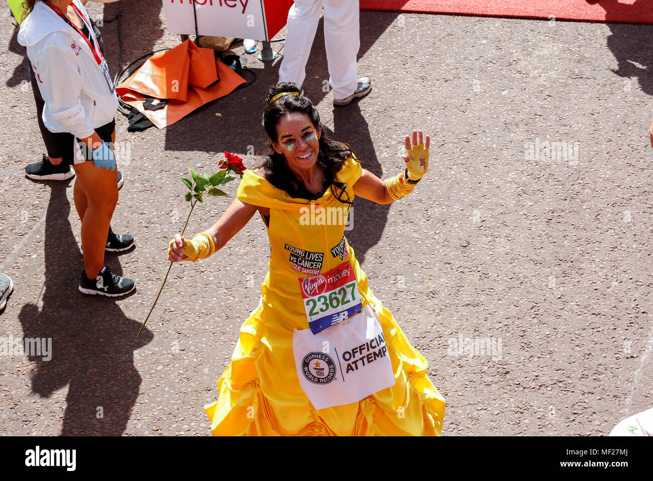 Runners dress in fancy costumes to fundraise money for charities during the Virgin Money London Marathon in London, England on April 22, 2018. Stock Photo