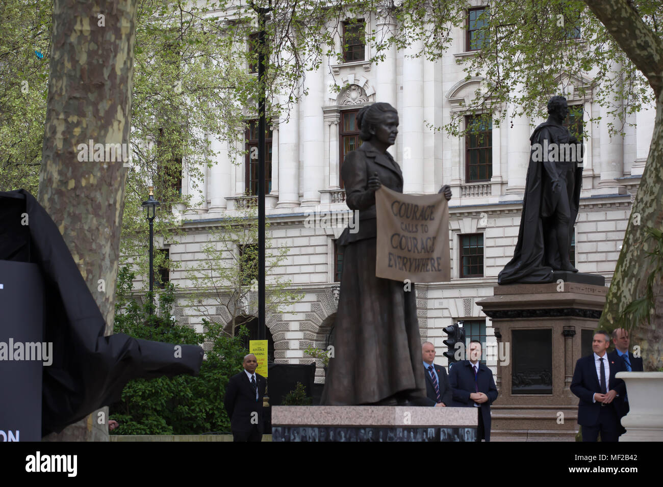 London,UK,24th April 2018,Millicent Fawcett statue Unveiling took place today in Parliament Square, London. The bronze figure has been designed by an artist called Gillian Wearing - the first female sculptor to have a work displayed here. Millicent Fawcett was an important character in the fight to win women the right to vote for who represented them in Parliament. In 1897 Millicent set up a group called the National Union of Women's Suffrage Societies, which believed in using non-violent tactics to persuade the government that women deserved the right to vote too.©Keith Larby/Alamy Live News Stock Photo