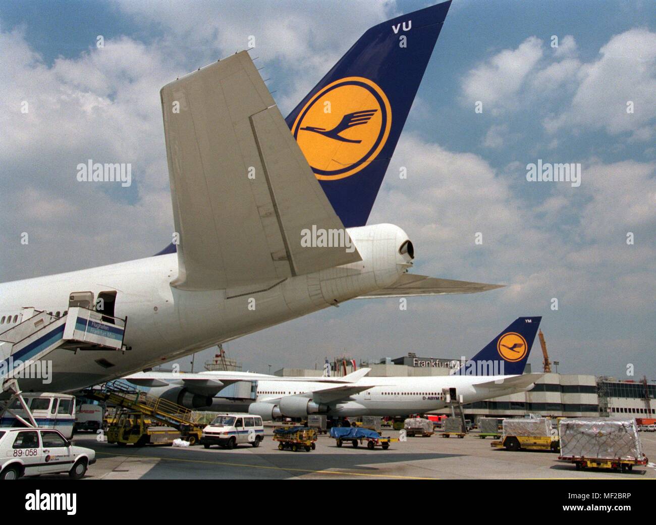 Aircraft of Deutsche Lufthansa AG are parked at Frankfurt Rhein-Main Airport on 24 June 1999 at their parking positions. | usage worldwide Stock Photo