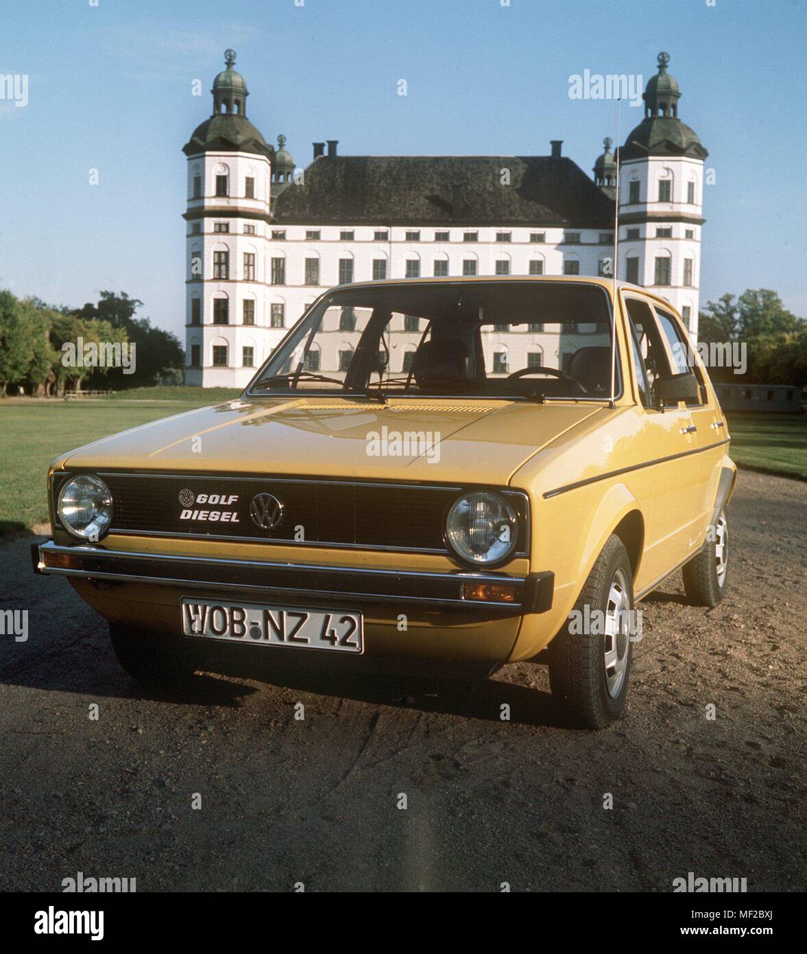 A yellow VW Golf is in September 1976 in front of Skokloster Castle near the Swedish capital Stockholm. The Golf is the first Volkswagen with diesel engine. | usage worldwide Stock Photo
