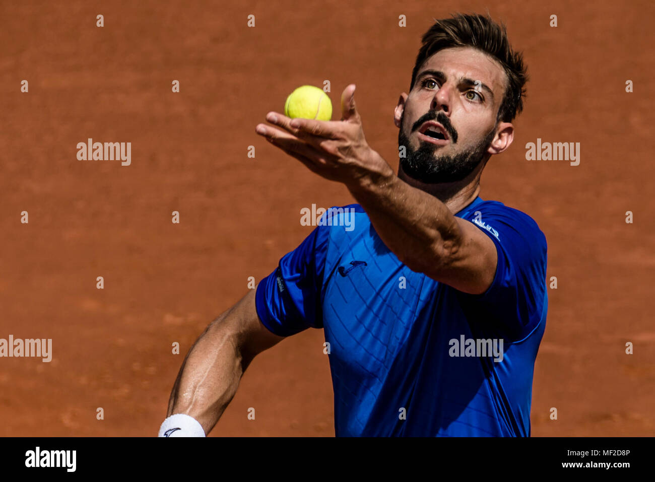 Barcelona, Spain. 24 April, 2018:  MARCEL GRANOLLERS (ESP)  serves against David Goffin (BEL) during Day 2 of the 'Barcelona Open Banc Sabadell' 2018. 4:6, 7:6, 6:2 Credit: Matthias Oesterle/Alamy Live News Stock Photo