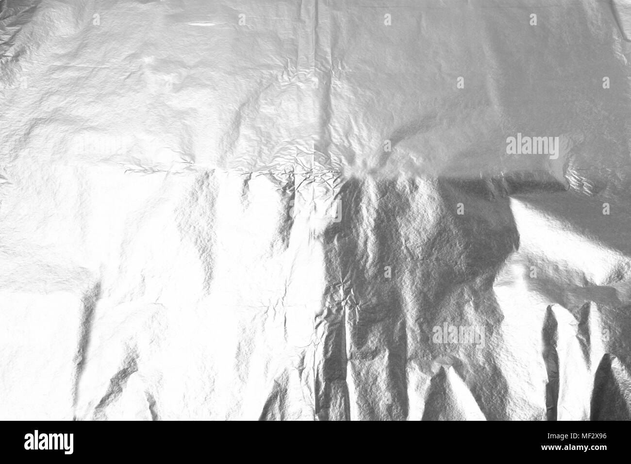 Foil paper texture for overlay artwork. Grunge effect background Stock