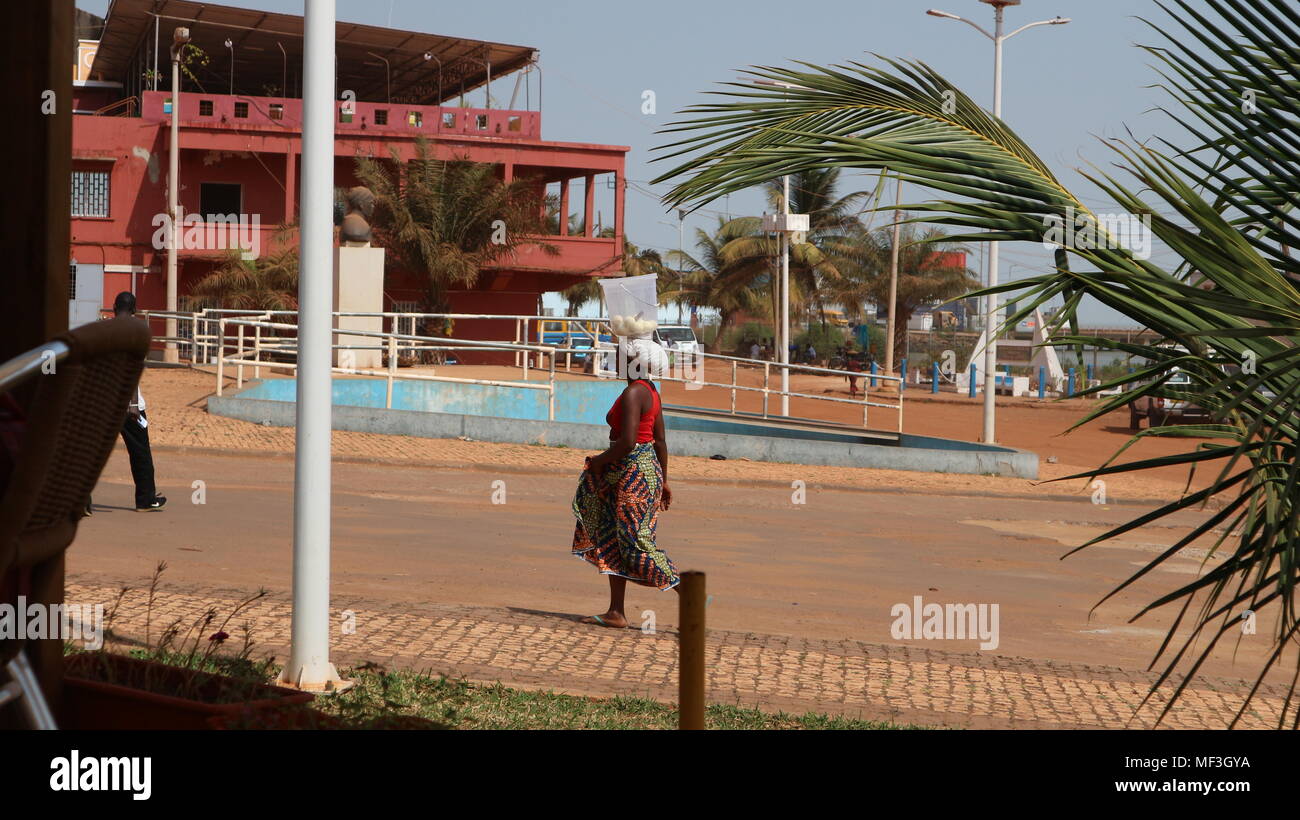 West African woman walking on the street in Bissau, Guinea Bissau. Stock Photo