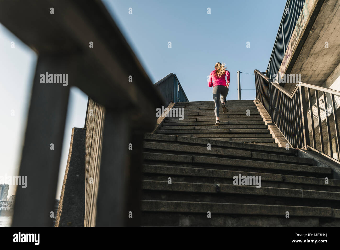 Running up stairs hires stock photography and images Alamy