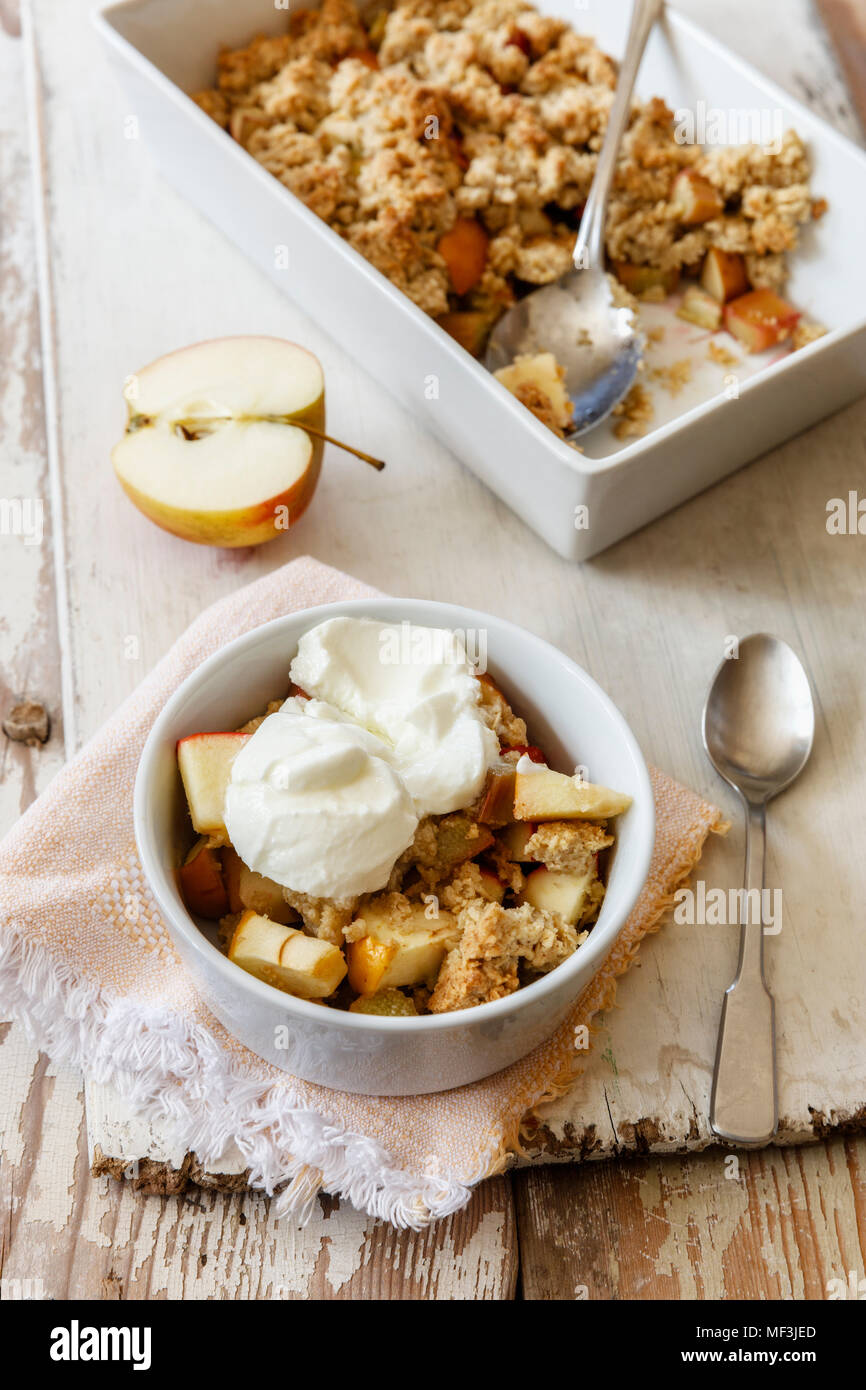 Oat flakes crumble cake with rhubarb and apple Stock Photo