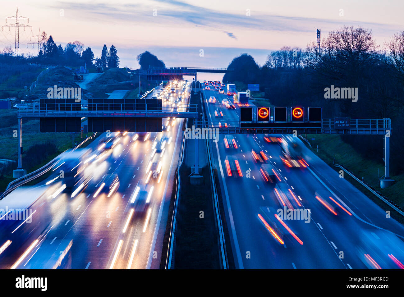 Germany, Baden-Wuerttemberg, Autobahn A8 near Wendlingen in the evening, light trails Stock Photo