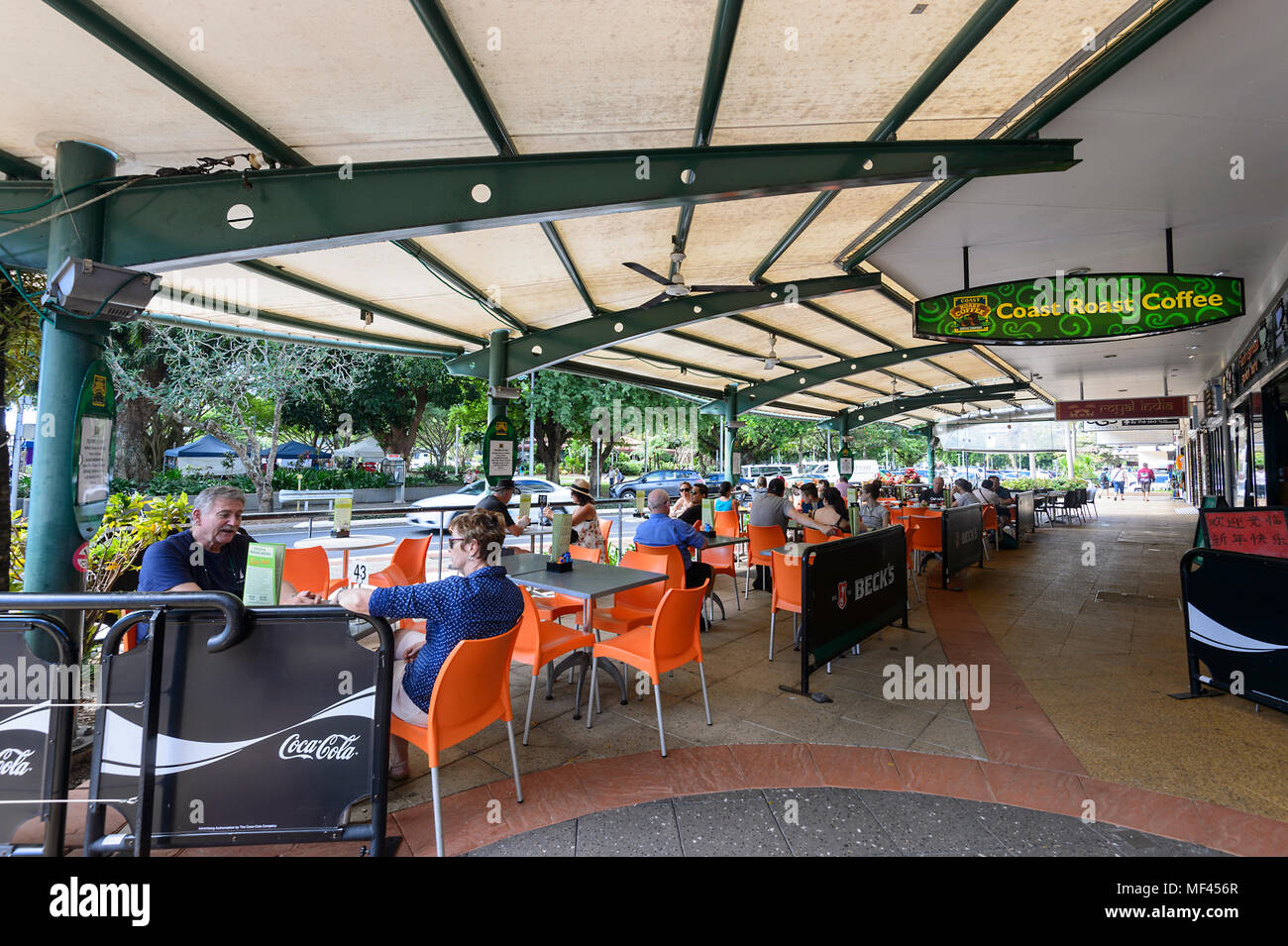 People sitting at the terrace of a Café in town centre, Cairns, Far
