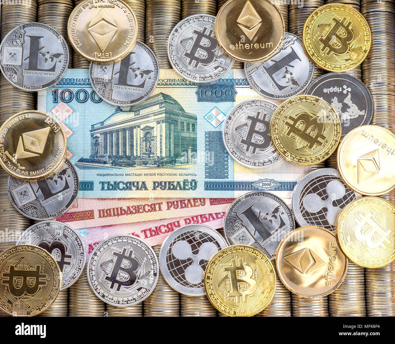 Silver Gold Crypto Coins Ethereum ETH, bitcoin BTC. Paper denominations  Belarusian ruble. Metal coins are laid out in a flat background, close-up  view Stock Photo - Alamy