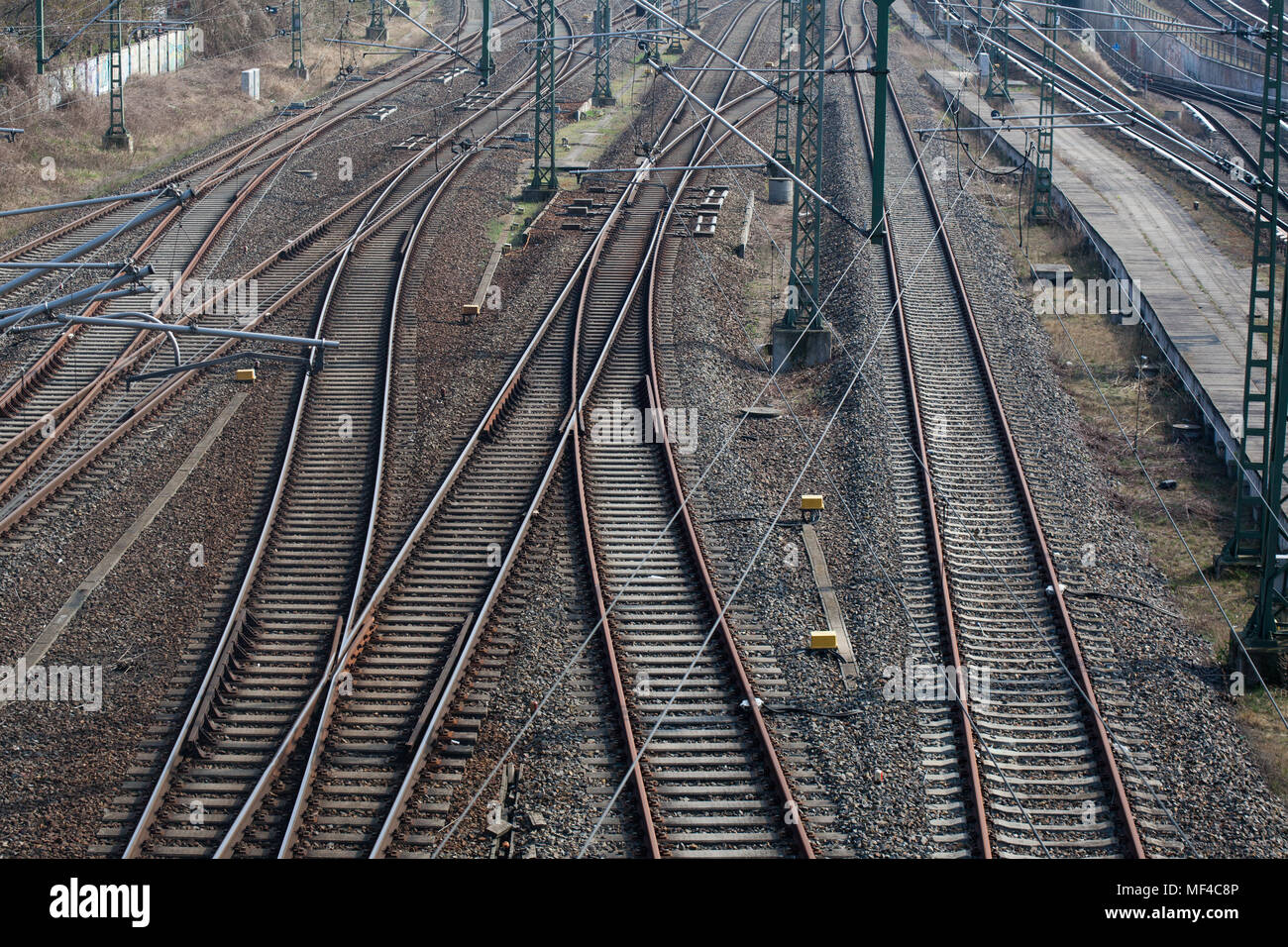 Train tracks with many options for ways forward with multiple switch points Stock Photo