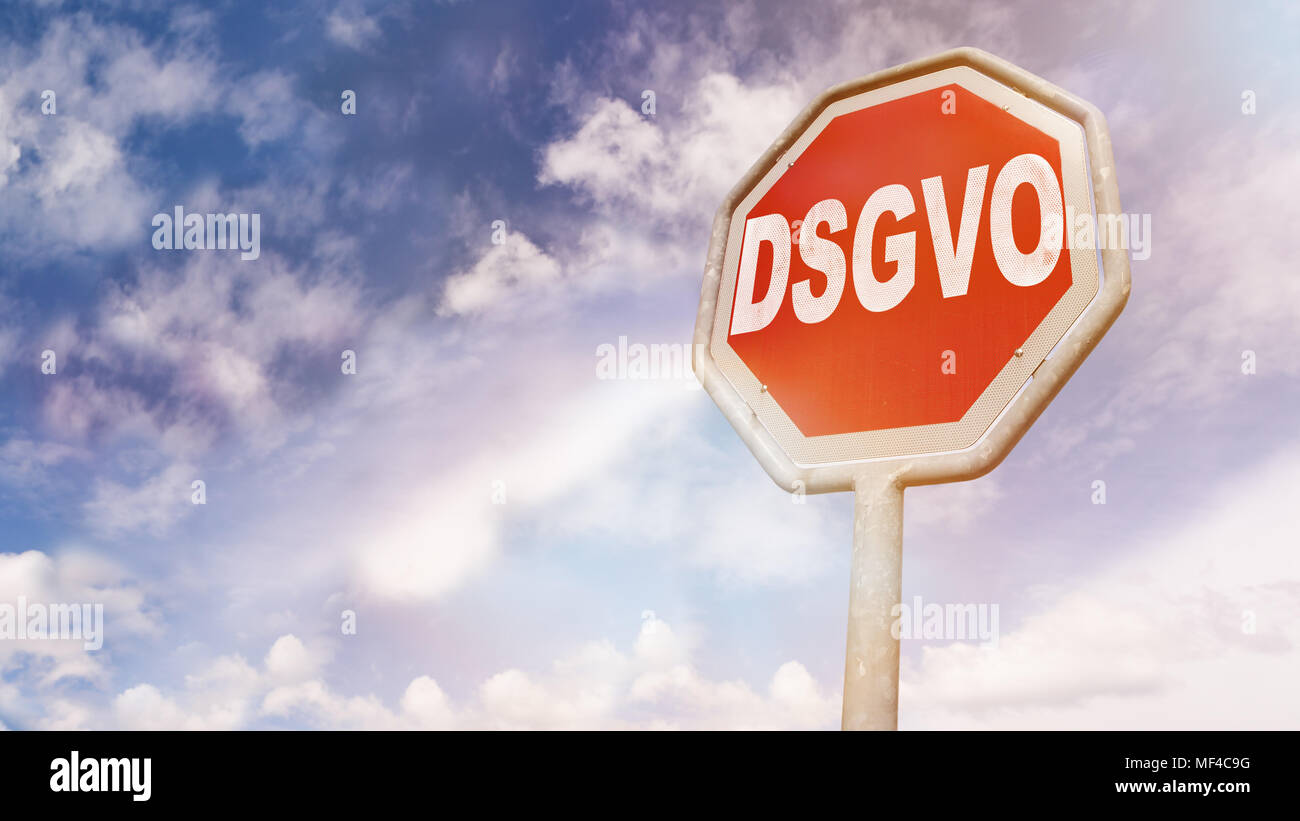 DSGVO (German for new regulation effective May 2018 in European Union on general data protection/privacy) message on stop sign as warning message for  Stock Photo