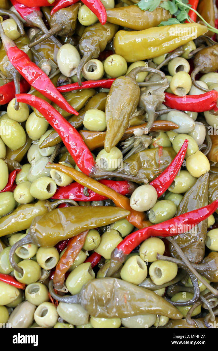 Green Olives and Peppers Mixture For Sale in a Moroccan Medina Stock Photo