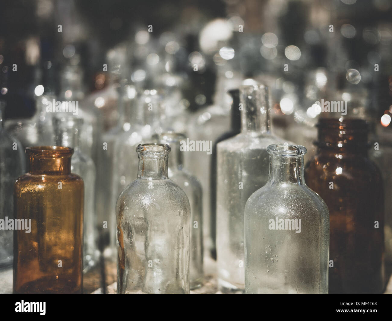 Old Glass Bottles Part - 45: Lots Of Vintage, Old Glass Bottles, Variety Colors, White, Green, Blu, Brown, Textur, Background