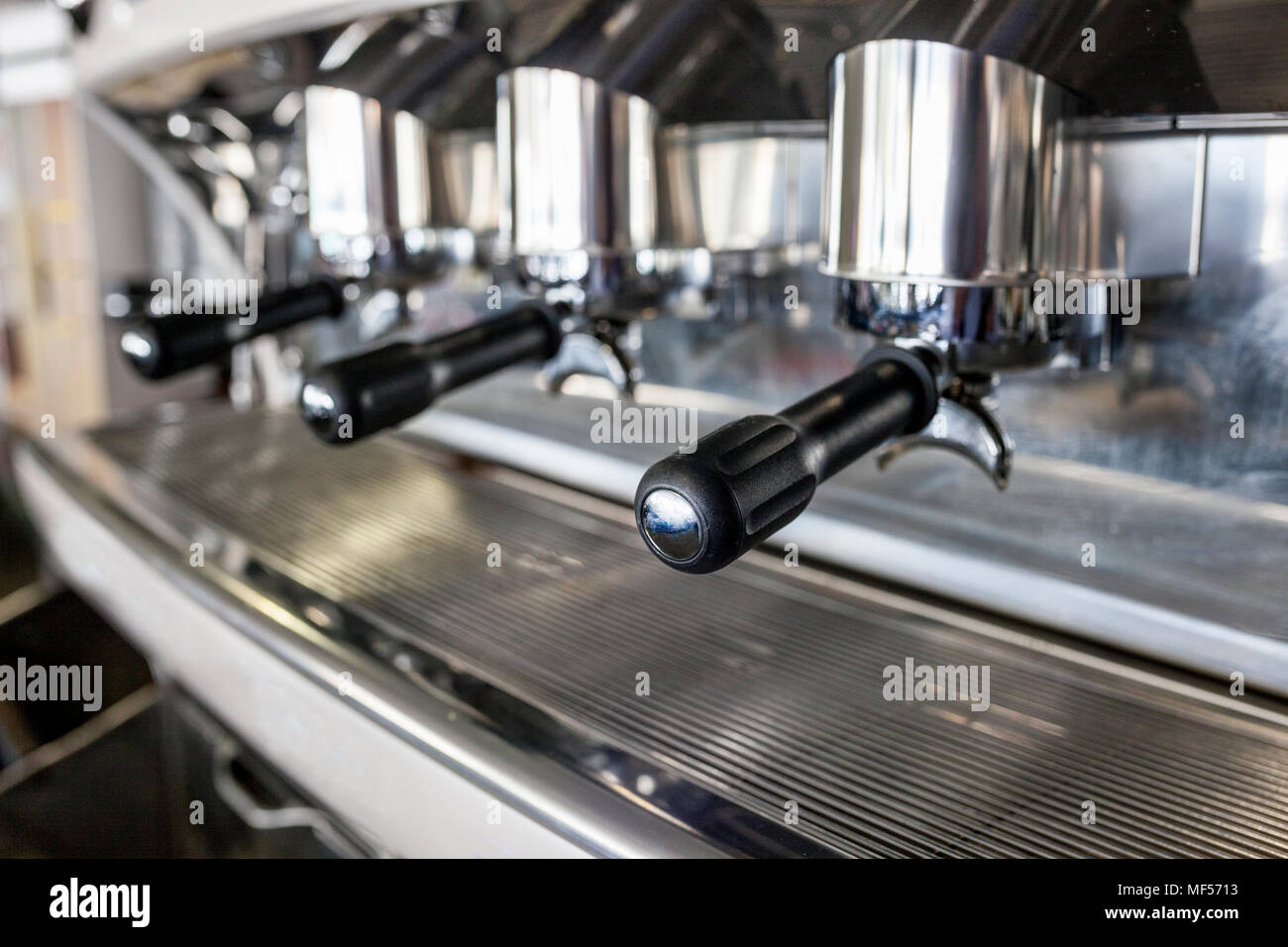 Holders on new vintage bar coffee machine. Selective focus Stock Photo