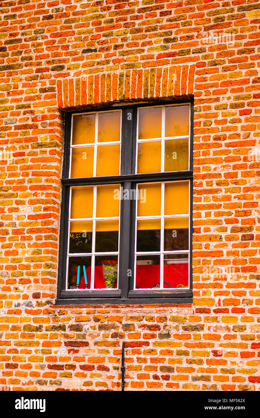 Medieval houses with flowers at the windows in the Historic Centre of ...