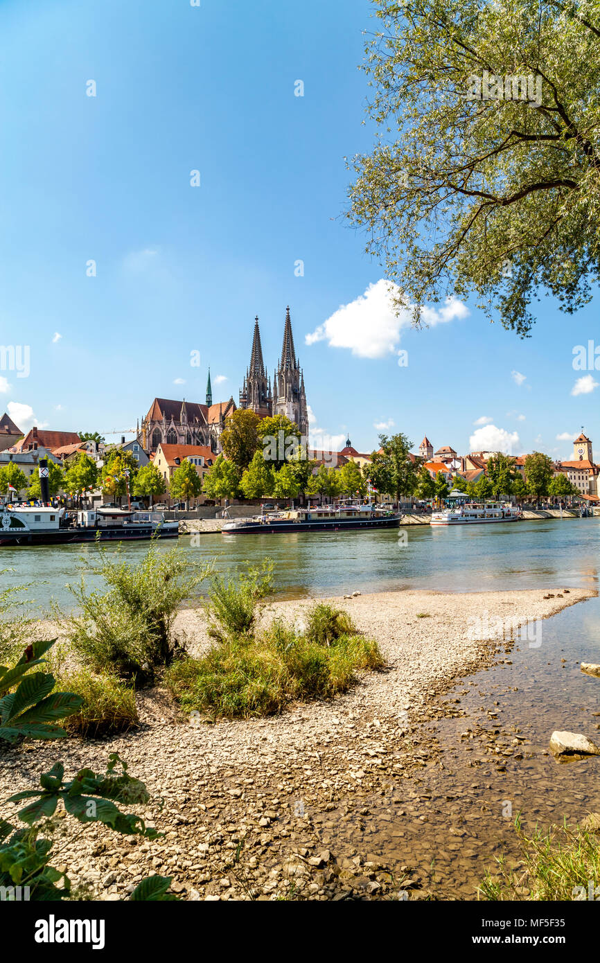 Germany, Regensburg, view of old town with cathedral and Danube River in the foreground Stock Photo