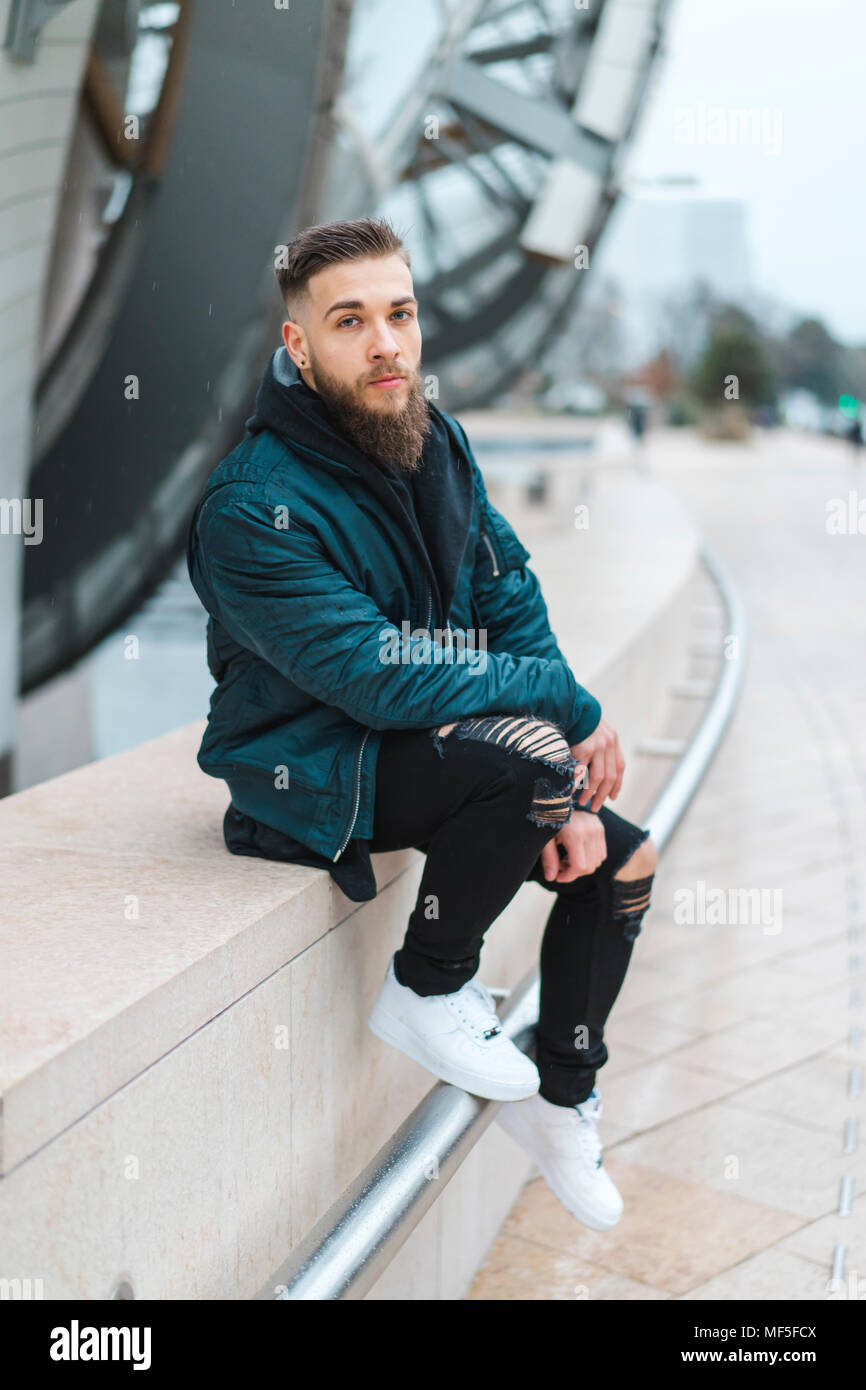 Bearded seated man looks hi-res stock photography and images - Alamy